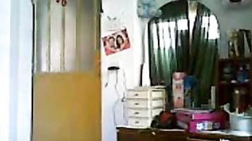 Horny aunty kissed and boobies fondled by young lover who then pulls down her panty to fuck her in standing position.