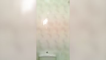 Desi Nymphos Undresses In Washroom